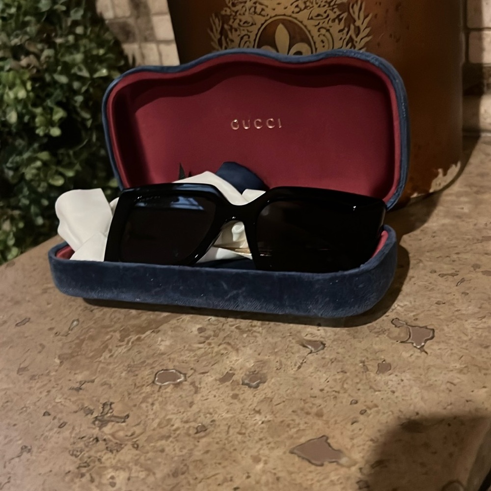 Gucci cat eye gold framed sunglasses